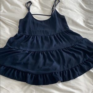 I’m selling a navy blue spaghetti strap shirt.